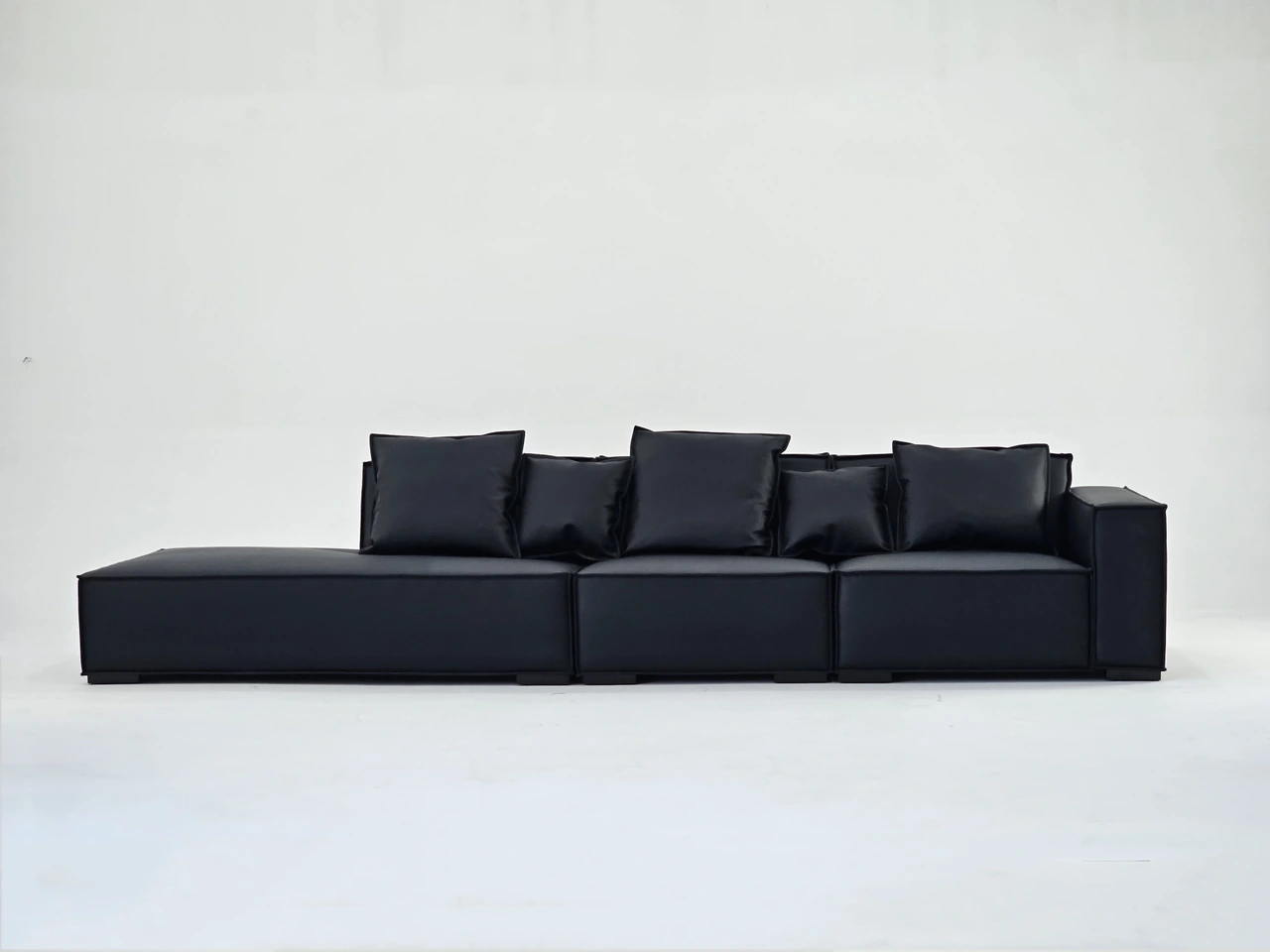 Sleek Black Leather Sofa with Modern Design
